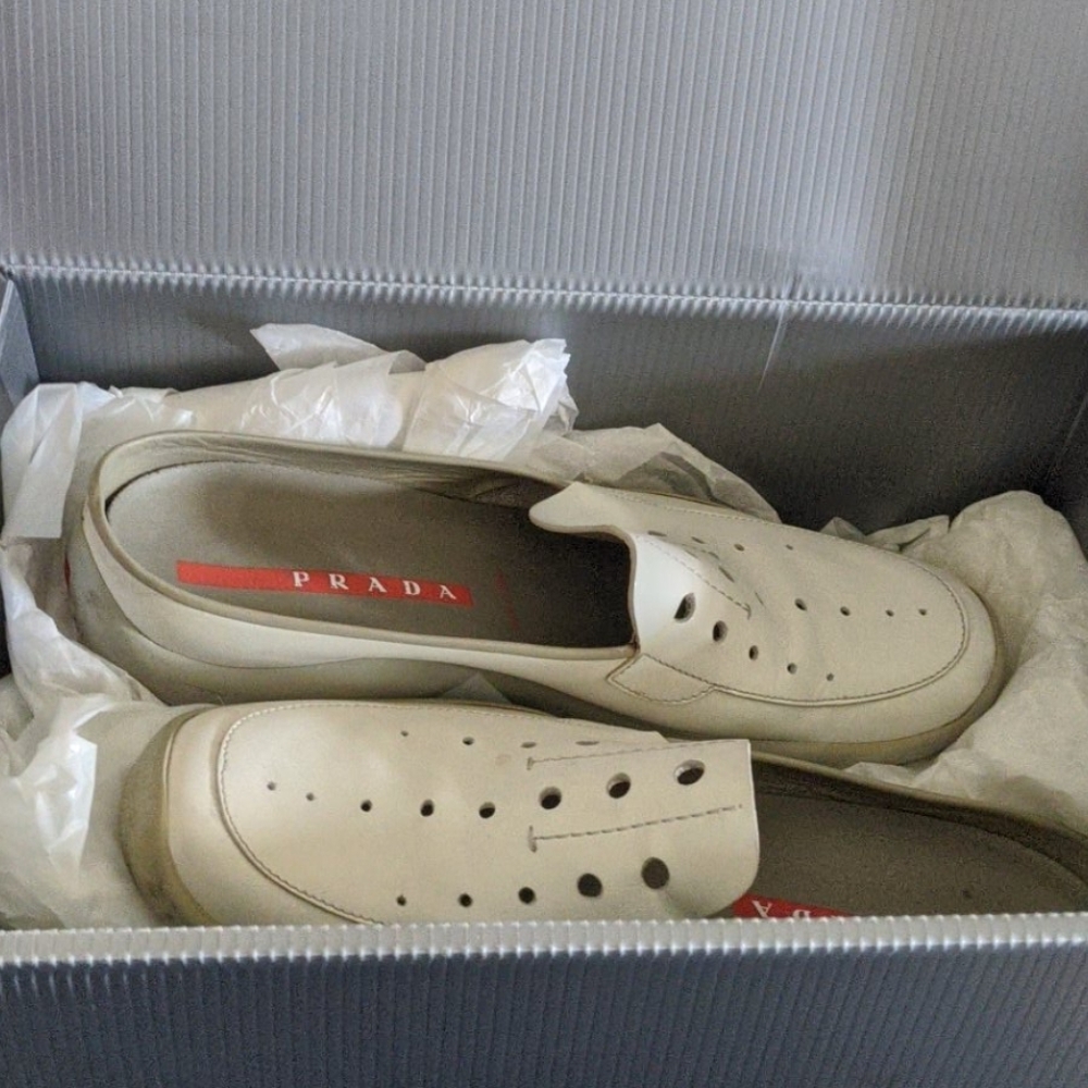 Prada white leather slip on